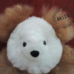 close-up of brown alpaca bear with white face – handmade in Peru