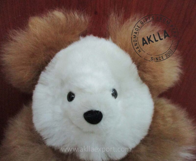 close-up of brown alpaca bear with white face – handmade in Peru