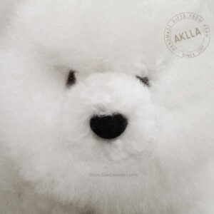 close-up of handmade white alpaca bear face – baby alpaca fur