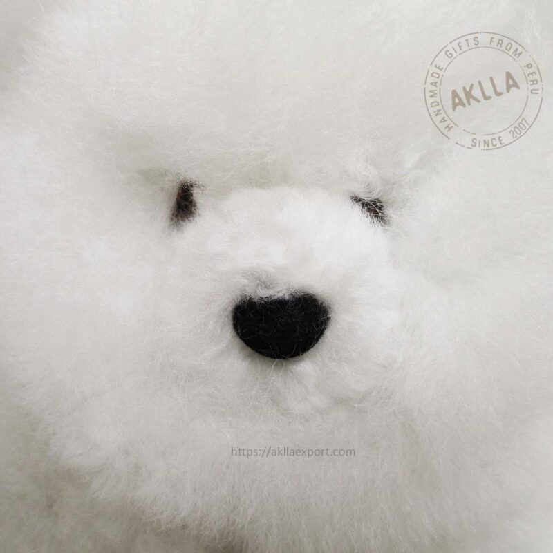close-up of handmade white alpaca bear face – baby alpaca fur