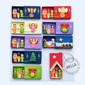 Beautiful Ceramic Christmas Crib Inside a Box of Matches with decoration in the exterior, in big variety of colors and designs.