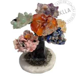 crystal tree handmade with quartz and semiprecious stones on pyrite base