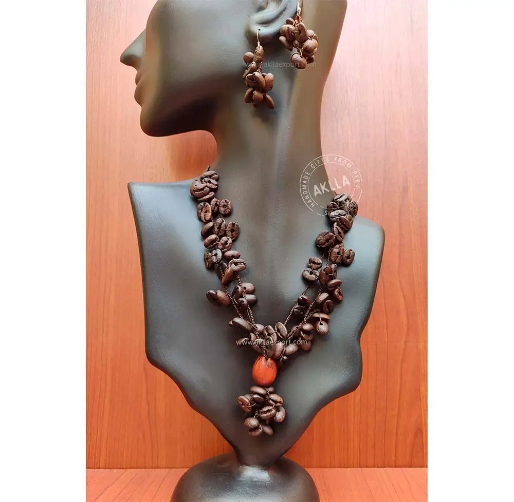 cofee-bean-necklace-earrings-handwoven-jewelry-peru Beautiful coffee bean necklace and earrings set. Handwoven in Peru.