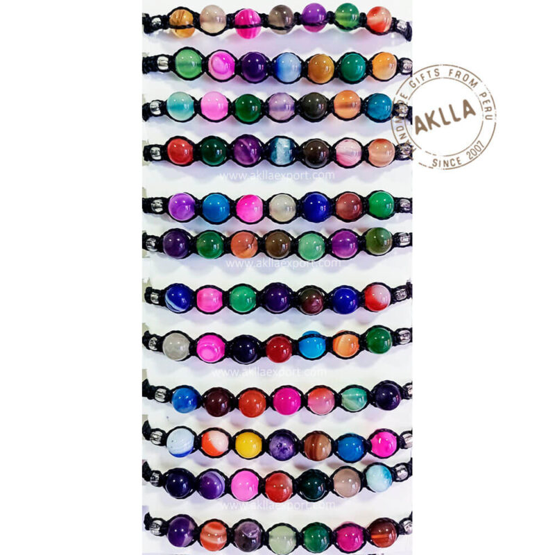Cat Eye Bracelets. 7 chakras bracelet handwoven from Peru with black thread.
