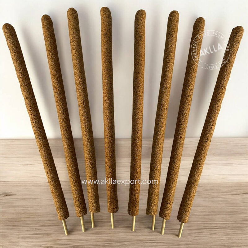 Natural Palo Santo Incense sticks arranged in a neat bundle, showcasing their rich, earthy color and texture against a neutral background