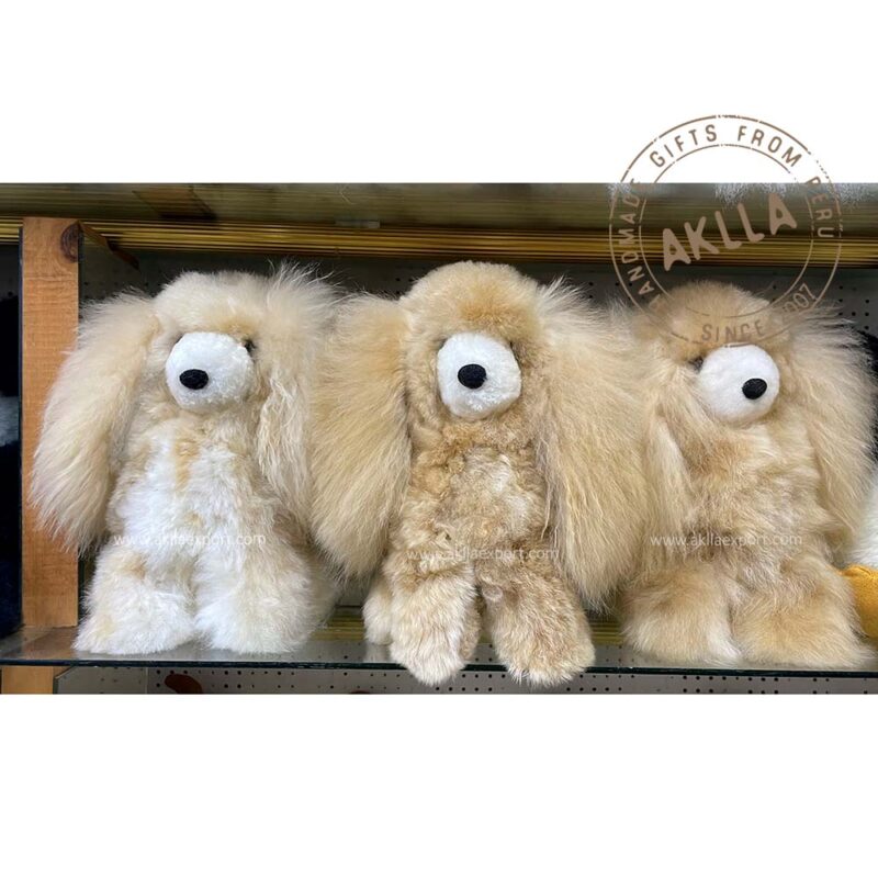 Handmade Cocker Spaniel alpaca stuffed animals made from alpaca fiber, soft and fluffy, crafted by Peruvian artisans.