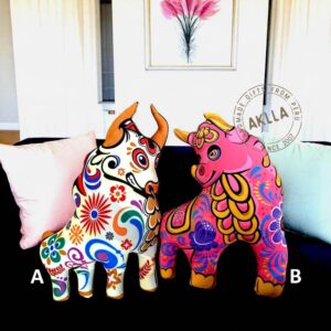 Animal pillows with double-sided print, handmade in Peru, Colorful bull-shaped.