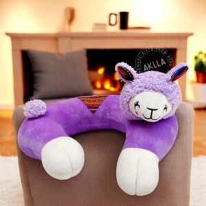Handmade llama pillows with smiling faces and Peruvian striped fabric