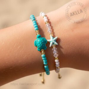 Beach bracelet wholesale with glass beads, starfish and turtle designs stacked on wrist