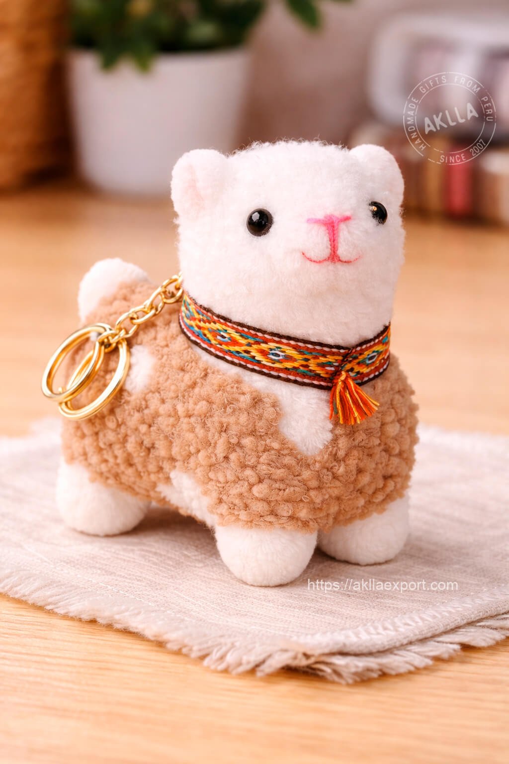 Llama Stuffed Toy Keychain – Light Brown Handmade Plush with Andean Detail Llama stuffed toy keychain light brown color with Andean textile band blue tassel and gold keyring