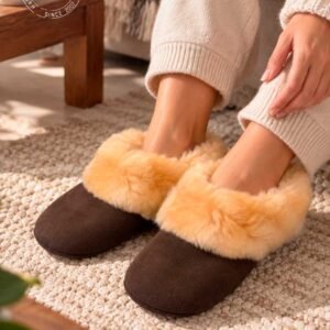 Alpaca slippers close-up showing soft fur trim and brown sole