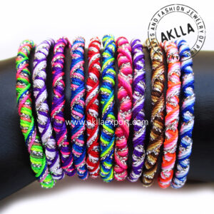 hand woven friendship bracelet with shiny silver thread